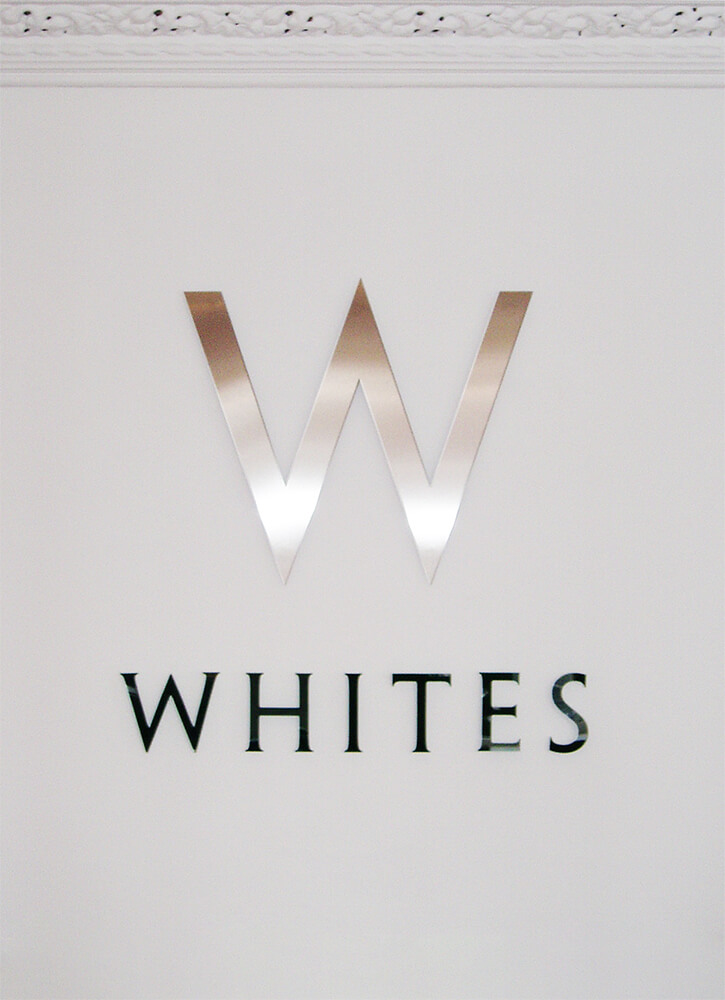 whites company logo wall sign